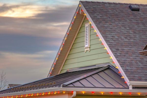 Roof,With,Christmas,Lights,Against,Cloudy,Sky